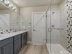 Meticulously maintained and upkept primary bathroom with separate water closet.
