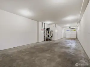 Bigger than it looks, fits 2 cars with lots more storage and closet.