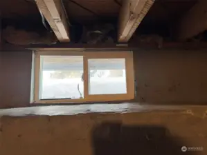 Newer vinyl window in basement