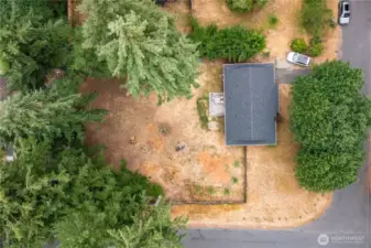 The established landscape and newly planted trees offer added privacy