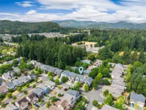 This aerial shot really captures the best of both worlds. Surrounded by lush mountainous forests, this West Olympia location is as tranquil as it is convenient.