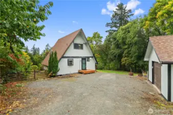 A-Frame retreat tucked away on 1.75 acres!
