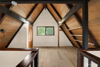 Loft area with closet is the second bedroom.