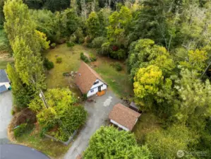 Detached garage + shed, and plenty of room for toys, projects, and storage.