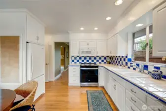 Spacious kitchen with breakfast nook that look out to backyard.