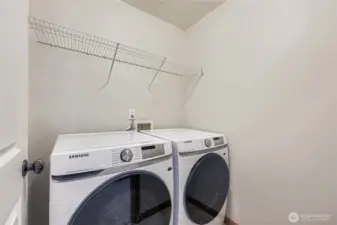 Upstairs Laundry center.  Washer and dryer stays with the house!