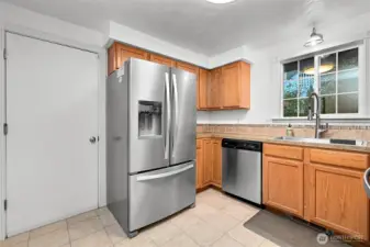 Door to garage enters through kitchen for easy garage access