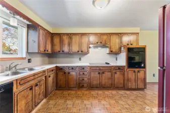 Roomy kitchen with tons of counterspace and storage - facing east
