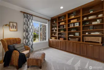 This library is stunning! Working from this home office would be amazing! Ample storage space makes this room not only very attractive, but functional as well.