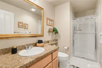 Main floor 3/4 bathroom, conveniently located down the hall from the living room.