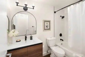Full bathroom remodel with modern finishes.