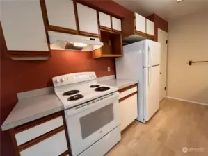 Modern-style kitchen with new appliances.