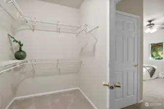 Primary walk-in closet.