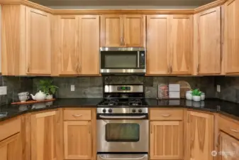 Custom cabinetry with lots of storage. Gas range.