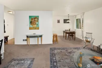 The dining room opens into a large open living room space.