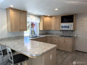 Spacious Kitchen with loads of cabinets rollout shelves  & organizers. #1250 Northcliff Rd, Shelton, WA 98584