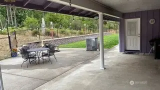 Covered patio with Flatscreen TV that stays. #1250 Northcliff Rd, Shelton, WA 98584