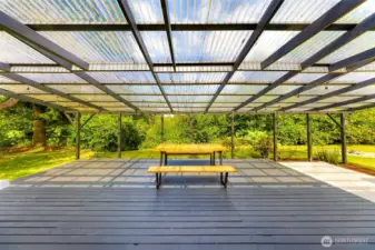 Wonderful covered deck off of the living room.