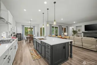 From the island, you can see how everything connects. The kitchen opens right into the dining and living spaces, making it easy to cook, chat, and stay part of the conversation.