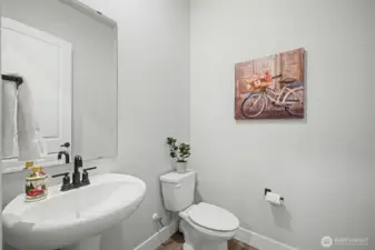 Powder room off of the living room.