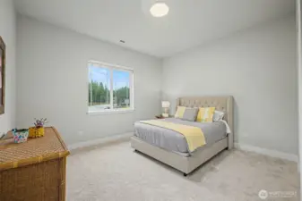 Guest room on the front of the house, featuring a large walk in closet.