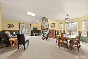 Comfortable Living Space leads out to the large wood deck and back yard.