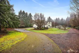 Entry to property.  Drive to the right leads to ADU and Barn/Office