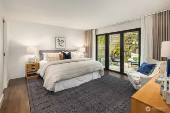Primary Bedroom with Doors to Patio