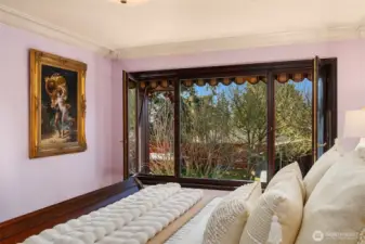 Primary Bedroom is Surrounded by Nature Featuring Relaxing Western Sunset Views