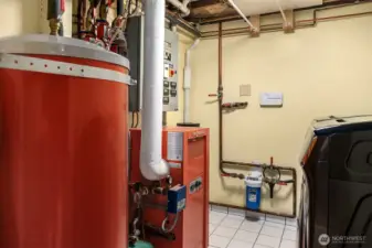 State of the Art Boiler & Radiant Heat System, Hotwater Tank, Whole House Water Filtration System & Laundry Room
