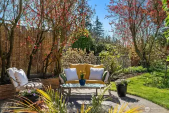 Fully Fenced Back Yard with Outdoor Living Spaces, Gardens, Fruit Trees & Flowers Galore