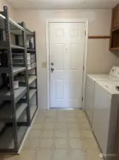 Utility room and door to carport - all appliances stay