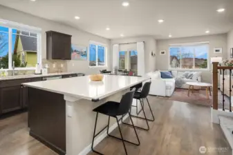 Kitchen, living area and dining areas.