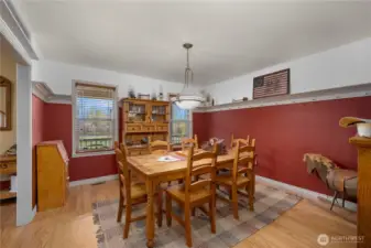 Large dining room can be accessed from front foyer or kitchen.