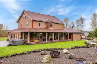 Large outdoor patio for entertaining and play. Hot tub stays! Relax and enjoy your beautiful country estate.Cozy fire pit and seating area.