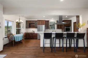 Built-in seating at the bar top plus dining nook looking to the lake.