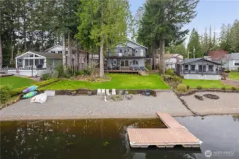 Lake front, no bank, private dock.