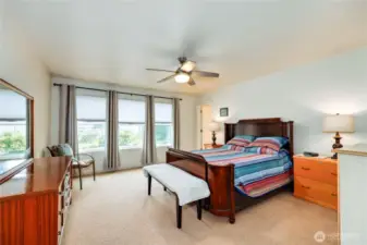 Large Primary bedroom with view of the water