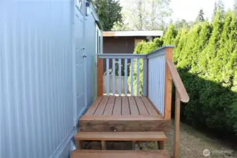 Back deck with newer door.