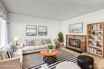 Welcoming main living area anchored by a wood-burning fireplace, perfect for cozy evenings.