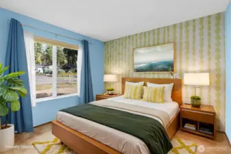 Main bedroom features a walk-in closet and offers direct access to the bathroom.