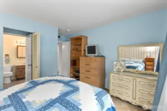Main bedroom features a walk-in closet and offers direct access to the bathroom.