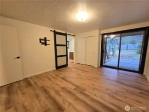Primary Bedroom leads to back patio