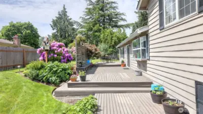 This spacious deck features custom bench seating for effortless outdoor entertaining.