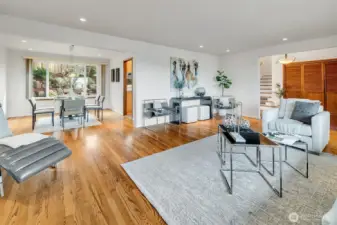 Living room open to the dining room with easy access to the kitchen.