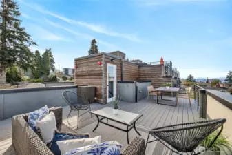 Watch the Sun Set to the West over the Sound and Mountains.