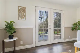 French doors in family room to back deck & yard