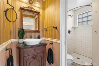 Bathroom with shower & laundry area