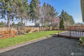Fully fenced backyard w/ expansive deck