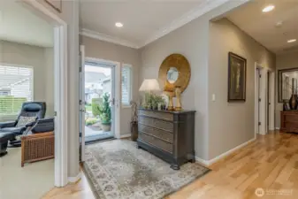 Great first impression! This inviting entry is flanked by a bright front office, ideal for guests or a quiet workspace.